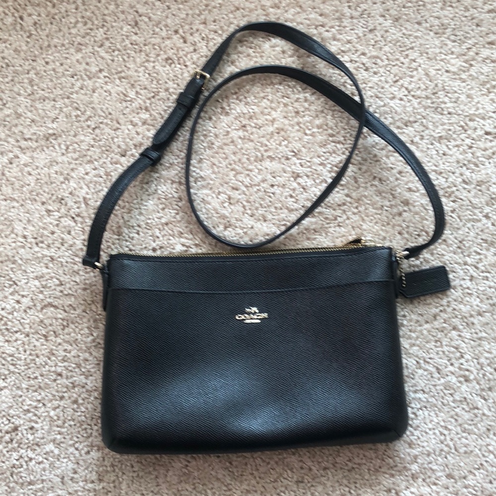 Slim black Coach crossbody purse